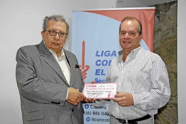 Jorge Raad Aljure, director de la Liga Contra el Cáncer seccional Caldas, y Nicolás Restrepo Escobar, director de LA PATRIA, dur