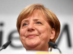 El bloque conservador de Merkel ganó las elecciones con un 32,9% de apoyos, según las proyecciones de voto, 12 puntos por delant