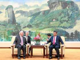 El secretario de Estado de EEUU, Rex Tillerson, y el presidente chino, Xi Jinping.