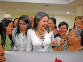 La dirigente opositora María Corina Machado (centro) durante un mitin político en Maturín, estado Monagas (noreste de Venezuela)