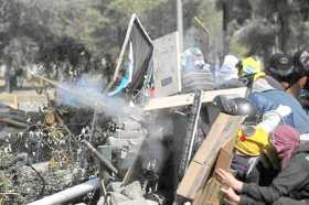 Fotos | Efe | LA PATRIA Barricadas en el centro de la ciudad.