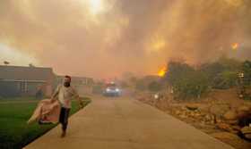 FOTO | EFE | LAPATRIA Se estima que la contención de ese incendio es del 78%.