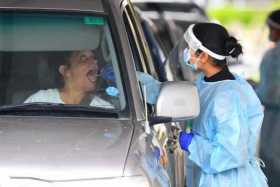 Casos globales de covid-19 suben a 84 millones