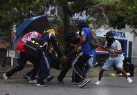 Policía atacó "intencionadamente" a manifestantes en Colombia, según Amnistía Internacional