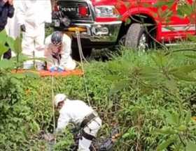 Fotos| LA PATRIA Rescate del cuerpo en zona boscosa de San Cayetano.