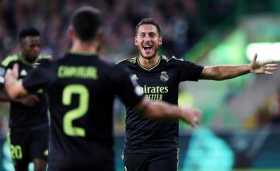 Eden Hazard del Real Madrid celebra después de marcar el tercer gol de su equipo durante el partido del grupo F de la Liga de Ca