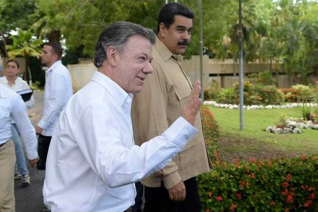 Juan Manuel Santos y Nicolás Maduro 