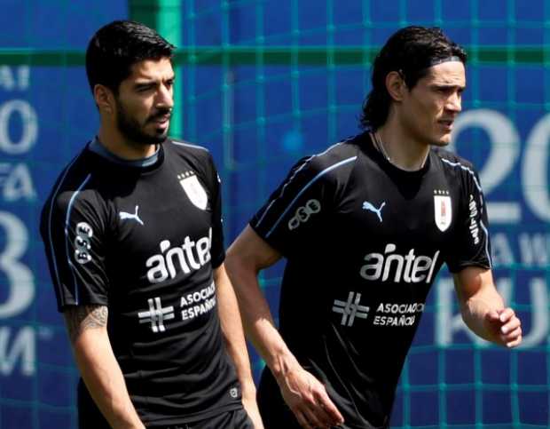 Luis Suárez y Édinson Cavani, dos armas de Uruguay para buscar el primer lugar del grupo hoy contra Rusia.