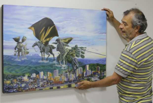 Carlos Alberto Valencia, durante el montaje de la exposición Costumbres en el Concejo de Manizales.