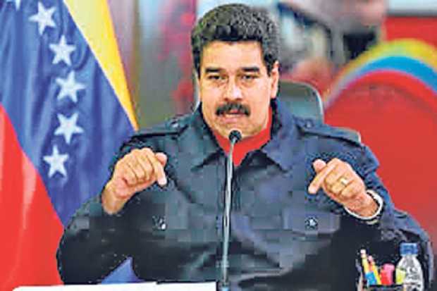 Simpatizantes radicales del presidente venezolano, Nicolás Maduro, e integrantes de los llamados colectivos chavistas, aseguraro