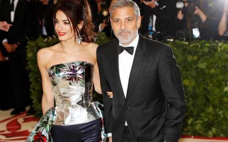 El actor George Clooney, y su esposa, Amal Clooney
