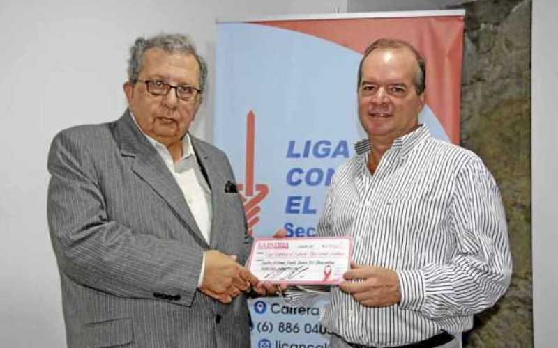 Jorge Raad Aljure, director de la Liga Contra el Cáncer seccional Caldas, y Nicolás Restrepo Escobar, director de LA PATRIA, dur